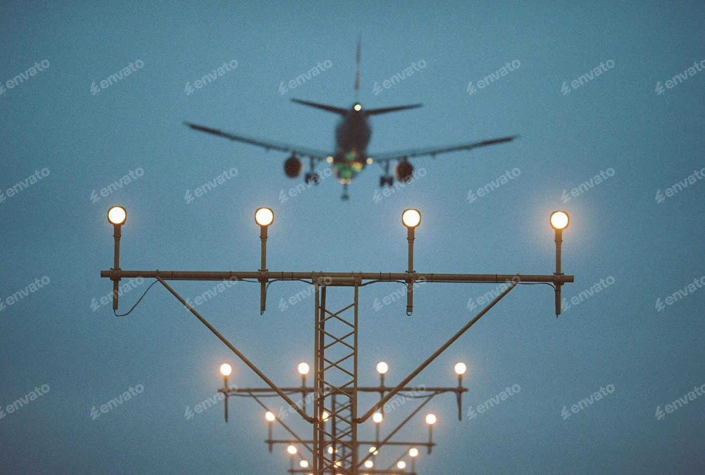 Airplane Landing at Twilight with Fog